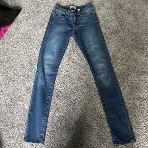 Buckle mid-rise skinny jeans 25Rx31 1/2